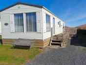 Decking outside the caravan (added by manager 19 May 2023)