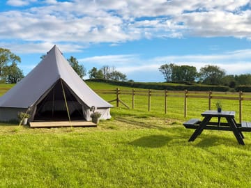 Bell tent and outdoor seating