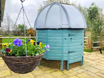 The pod is set in a small private garden
