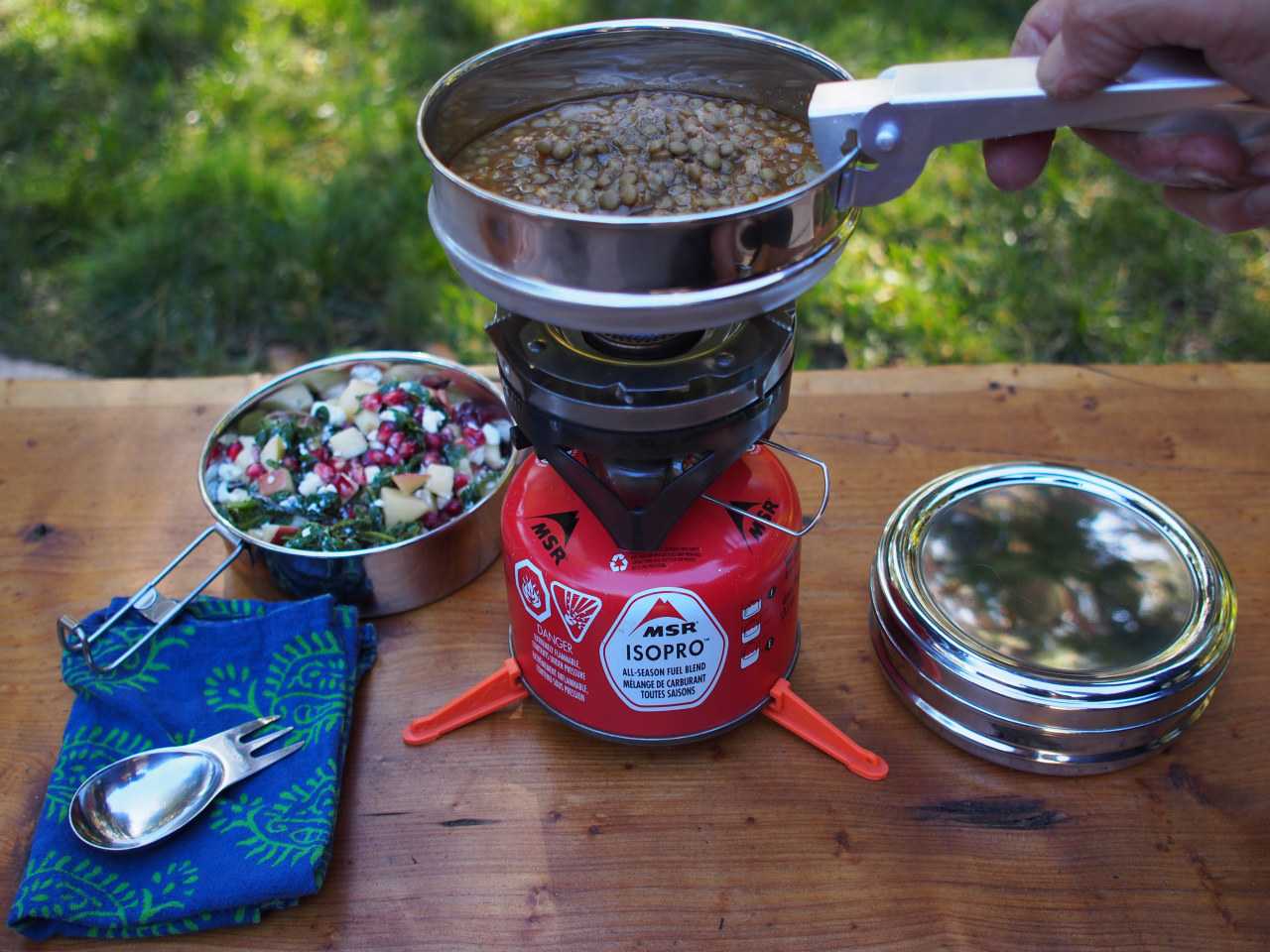 A camping stove is a handy alternative to cooking over a campfire (by Sandra Harris on Unsplash)