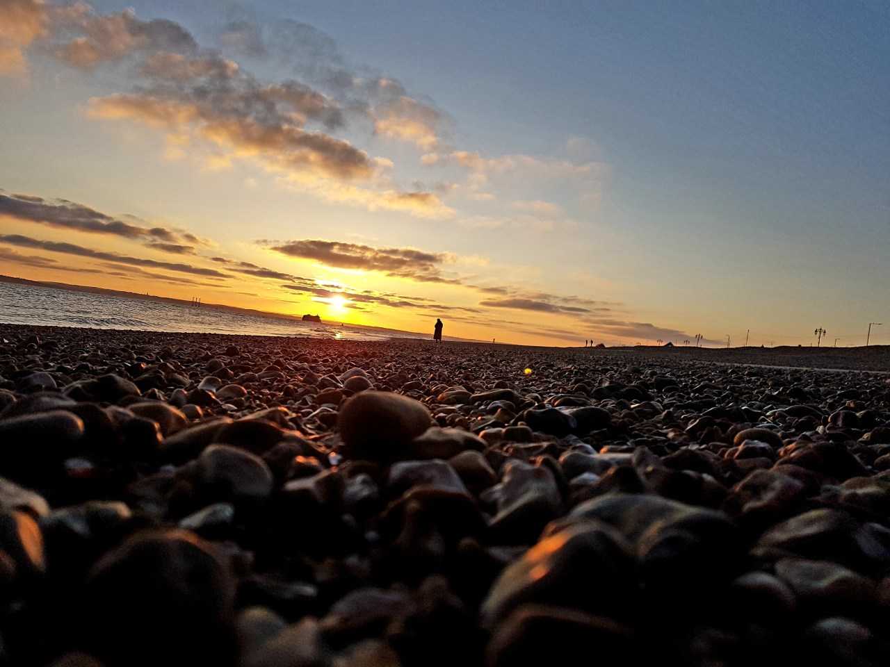 Sunset across the ocean at Southsea, Hampshire (Peter Chiykowski on Unsplash)