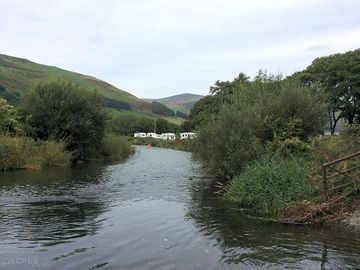 The river dysynni bordering the site (added by manager 27 aug 2017)