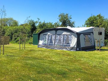 Touring caravan on spacious grass pitch (added by manager 29 jul 2022)