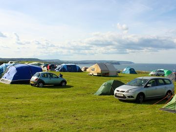 Large tent field with sea views. no set pitches so you choose where you go. (added by manager 19 jan 2016)