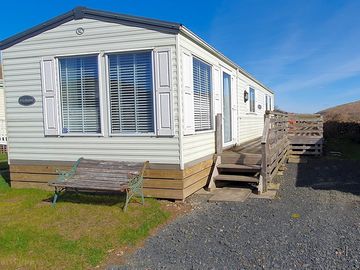 Decking outside the caravan (added by manager 19 may 2023)
