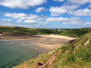 Manorbier beach and castle. the campsite has a private path right down to the beach. (added by visitor 08 jul 2018)