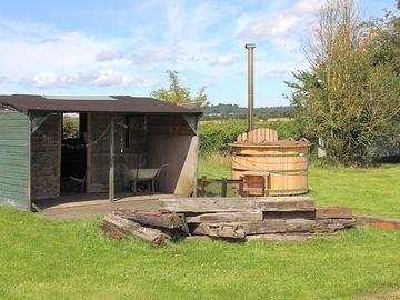 The brazier and wood burning hot tub shared amongst yurt guests (added by manager 24 jul 2016)