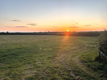 Sunset over west ceffyl campsite (added by manager 10 may 2024)