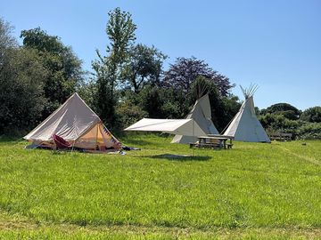 Tipis next to a family's bell tent (added by manager 20 jul 2021)