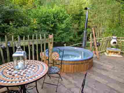 Wood-fired hot tub on the private decking