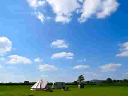 The camping field sits in the glorious Marshwood Vale with views of Pilsdon Pen and Colmers Hill
