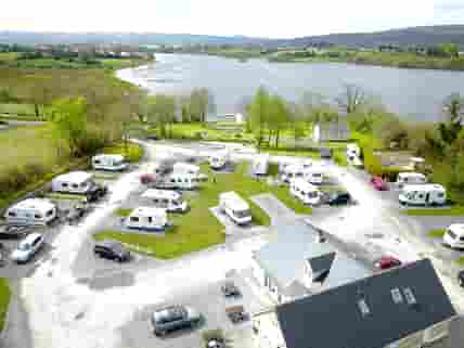 An aerial shot of Lough Arrow Touring Park with views across the bay. (added by manager 28 Aug 2019)