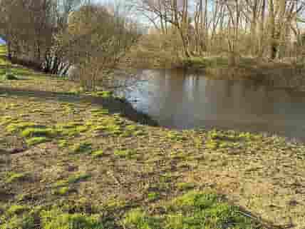 Riverside pitches - easy access to fishing and swimming
