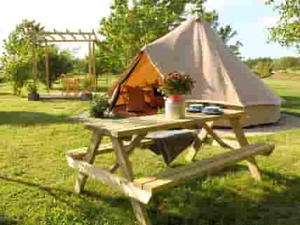 Bell tent and picnic table