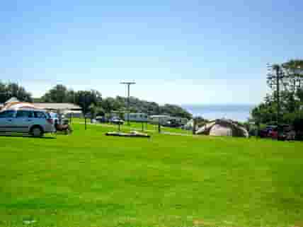 The camping fields showing the static caravans in the distance, and wonderful views out to sea