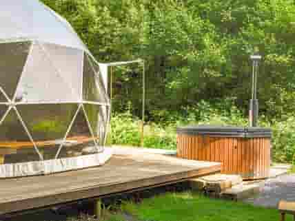 View of geodome and wood fired hot tub