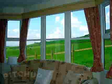 The view out of our Luxury three bedroom Static Caravan in the Peak District over open countryside. (added by manager 07 Mar 2012)