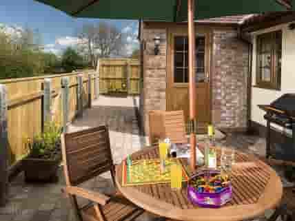 Table, chairs and barbecue in the patio garden (added by manager 21 May 2015)