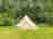 Strive Glamping: Bell tent sheltered by trees 