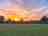Little Rodmore Camping: Visitor image - Sunset over field 2 
