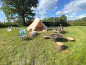 Typical Bell Tent set up including outside seating area and firepit (added by manager 07 Jun 2021)