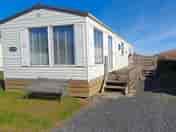 Decking outside the caravan (added by manager 19 May 2023)