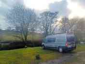 Campervan pitched by the river (added by manager 04 Mar 2024)