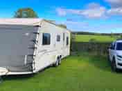 Our tourer on a grass electric pitch (added by visitor 27 Sep 2021)