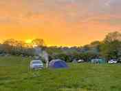 Visitor image of the camping field at sunset (added by manager 10 Feb 2023)