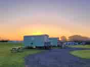 Sunrise over Poplar Grove campsite (added by visitor 31 Aug 2021)
