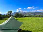 The view from the top field. blencathra in the distance. (added by visitor 07 Sep 2023)