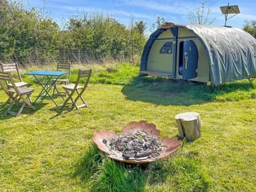 Exterior of the Landpod with firepit, table and chairs (added by manager 29 Sep 2022)