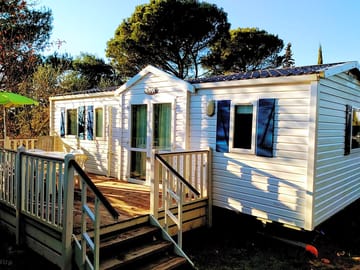 Terrace and entrance of a superior static caravan