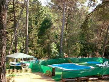 Outdoor swimming pools surrounded by pine trees (added by manager 27 Aug 2015)