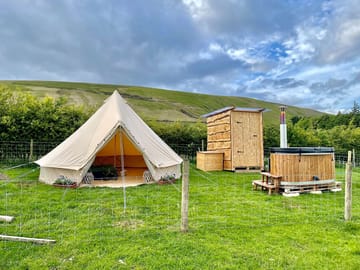 Bell tent, hot tub and shower shack
