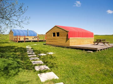 The view of both cabins as you enter the site (added by manager 01 Sep 2016)