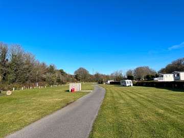 Middle field. Grass touring pitches, with stream running all the way down the left side