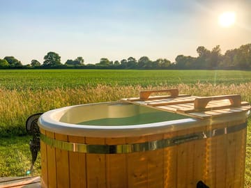Private wood-fired hot tub with far-reaching views (added by manager 01 Feb 2023)
