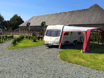 Unit on the gravel pitch with an awning (added by manager 08 Jul 2015)