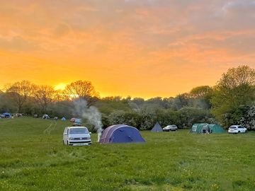 Visitor image of the camping field at sunset (added by manager 10 Feb 2023)