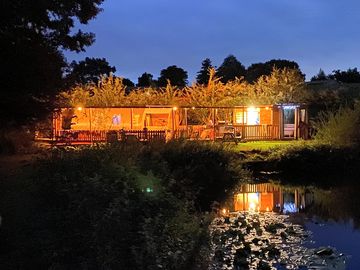 The cabin complex lit up at night (added by manager 10 Sep 2022)