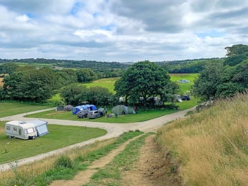 A visitor image of the lovely walk up to the village with a view of the campsite