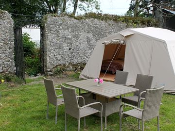 The safari tent and outdoor seating