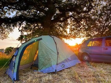Watch the sun set right from your tent