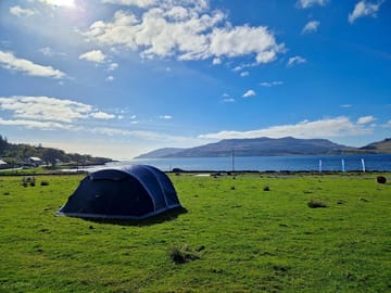 Tent field with sea views