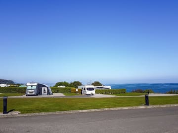 Fully-serviced pitches by the sea