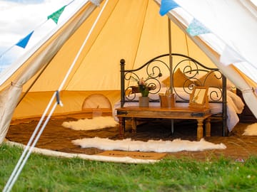 Bell tent with real bed at Orchard View Farm
