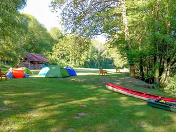 Large lawn for tents and canoe available