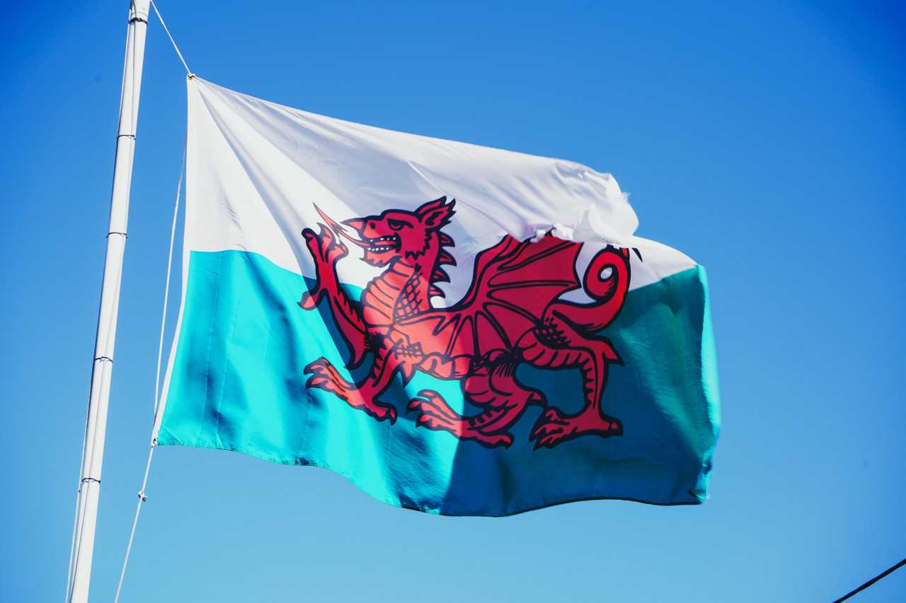A Welsh flag flying in the breeze
