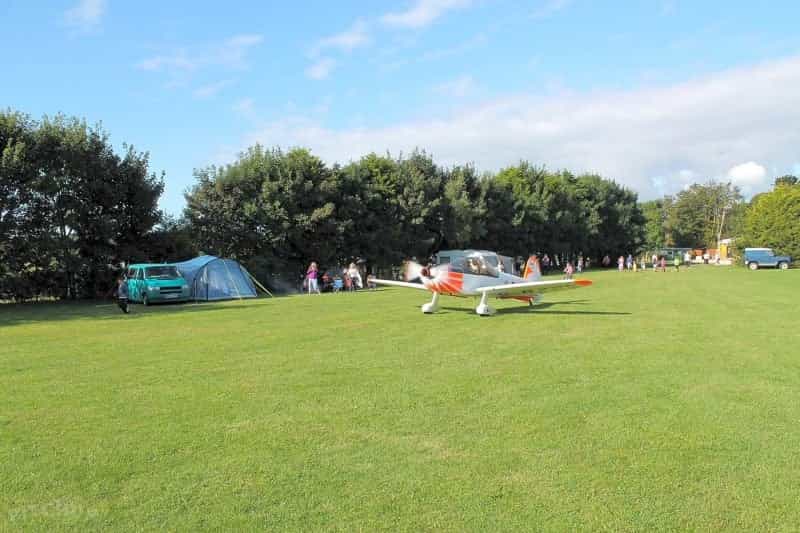Pick a pitch by the planes at Branscombe Airfield and Camping